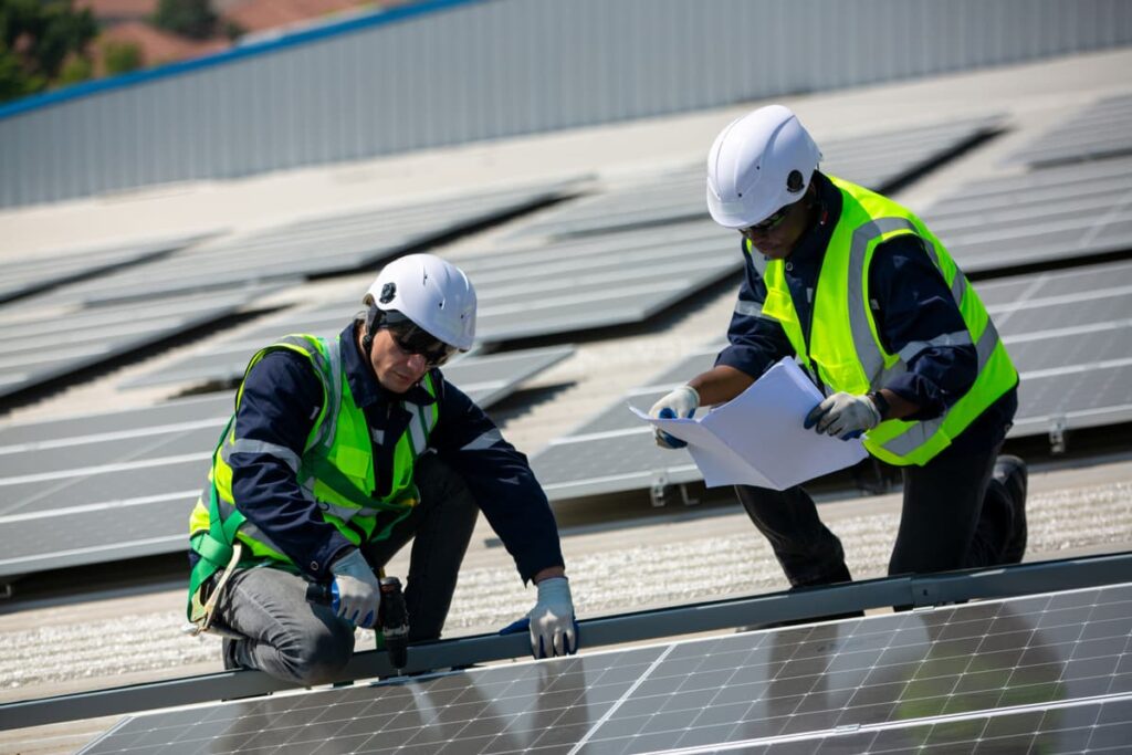 solar-panel-installer-installing-solar-panels