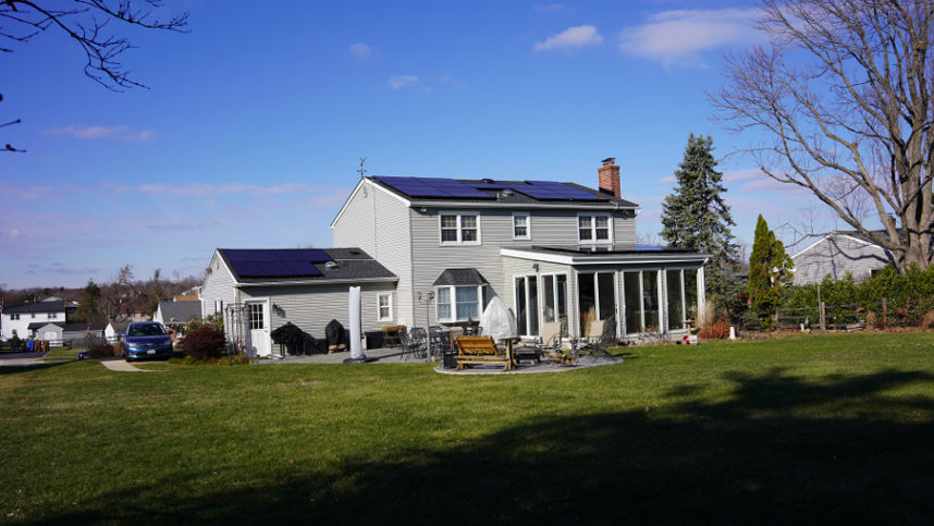 Roof-mounted solar panel system installation.